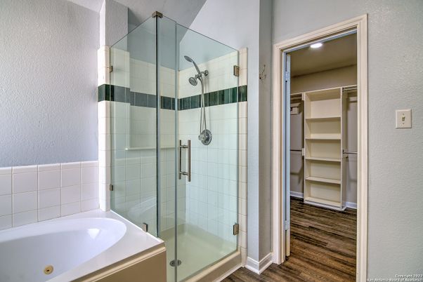 Bathroom, Glass Shower, Interior, Recessed Lighting, Walk-in Closets, Wood Texture Flooring