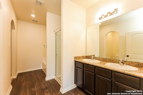 Bathroom, Dual Sink Vanities, Interior, Recessed Lighting, Wood Texture Flooring