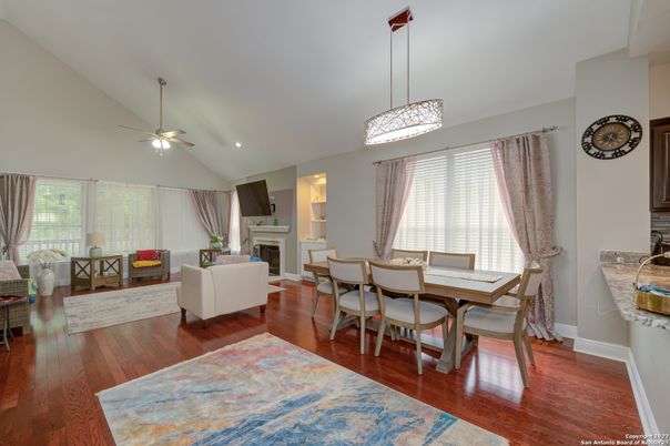Dining room, Fireplace, Interior, Living room, Pendant Lights, Recessed Lighting, Wood Texture Flooring