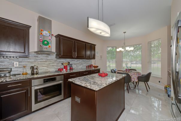 Chandelier, Dining room, Interior, Kitchen, Pendant Lights, Stainless Steel Appliances