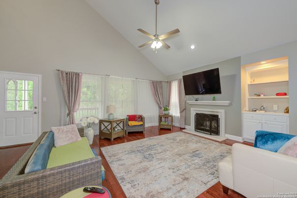 Bedroom, Fireplace, Interior, Living room, Recessed Lighting, Wood Texture Flooring