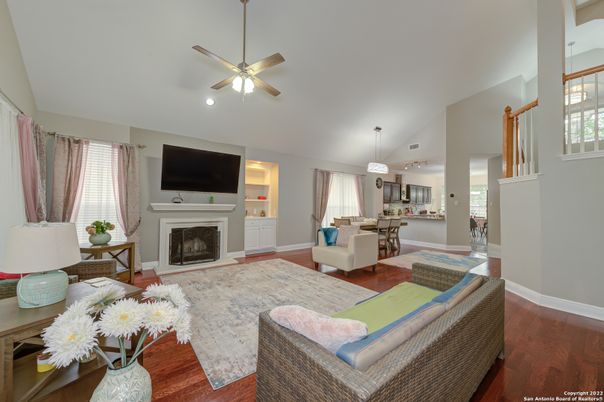 Dining room, Fireplace, Interior, Living room, Pendant Lights, Recessed Lighting, Wood Texture Flooring