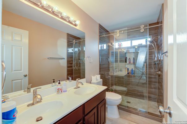 Bathroom, Dual Sink Vanities, Glass Shower, Interior, Wood Texture Flooring