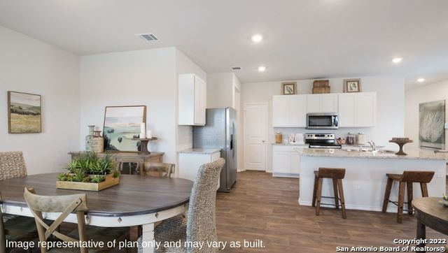 Dining room, Interior, Kitchen, Recessed Lighting, Stainless Steel Appliances, Wood Texture Flooring
