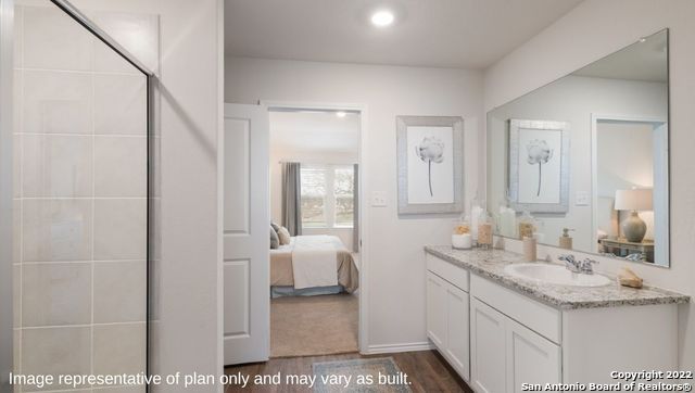 Bathroom, Bedroom, Dual Sink Vanities, Interior, Recessed Lighting, Wood Texture Flooring