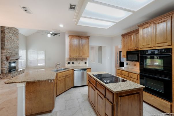 Fireplace, Interior, Kitchen, Recessed Lighting, Stone Walls