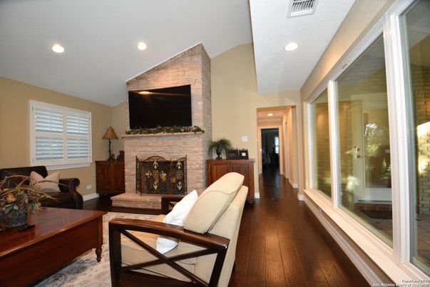 Fireplace, Interior, Living room, Recessed Lighting, Wood Texture Flooring