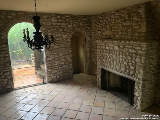 Chandelier, Fireplace, Interior, Stone Walls
