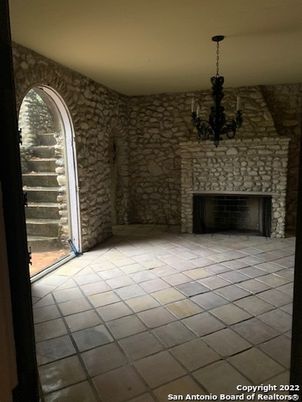 Chandelier, Empty room, Fireplace, Interior, Stone Walls