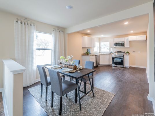 Dining room, Interior, Kitchen, Recessed Lighting, Stainless Steel Appliances, Wood Texture Flooring