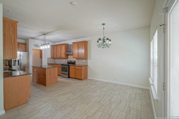 Chandelier, Interior, Kitchen, Pendant Lights, Stainless Steel Appliances, Wood Texture Flooring
