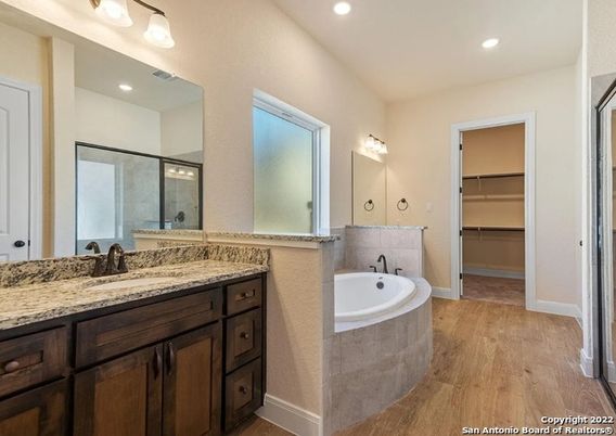 Bathroom, Dual Sink Vanities, Interior, Recessed Lighting, Wood Texture Flooring