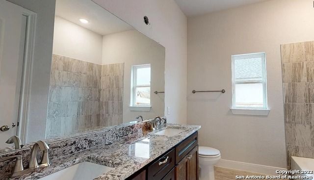 Bathroom, Dual Sink Vanities, Interior, Recessed Lighting, Wood Texture Flooring