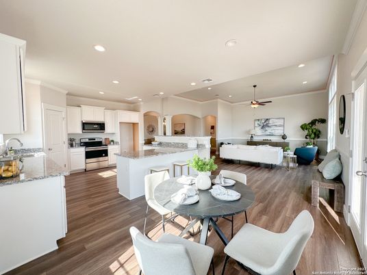 Dining room, Interior, Kitchen, Living room, Recessed Lighting, Stainless Steel Appliances, Wood Texture Flooring