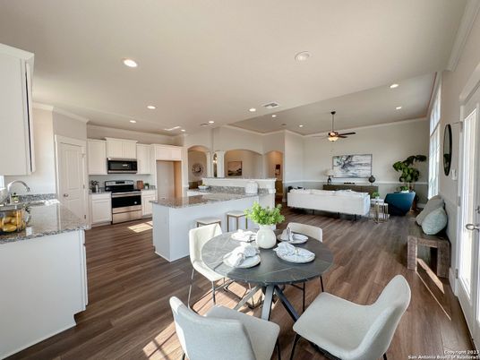 Dining room, Interior, Kitchen, Living room, Recessed Lighting, Stainless Steel Appliances, Wood Texture Flooring