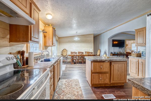 Dining room, Interior, Kitchen, Living room, Pendant Lights, Stone Walls, Wood Texture Flooring