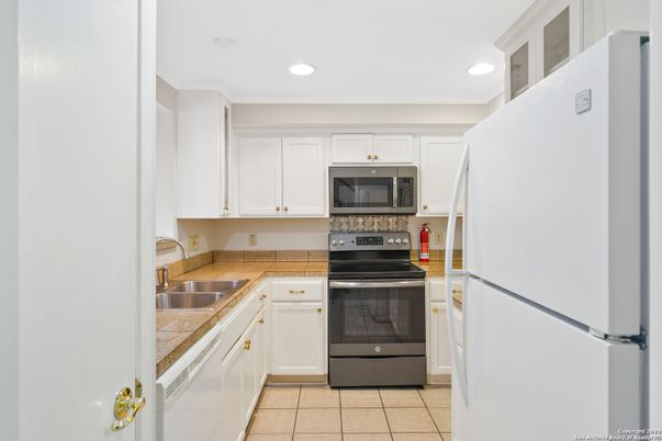 Interior, Kitchen, Recessed Lighting, Tile Countertops