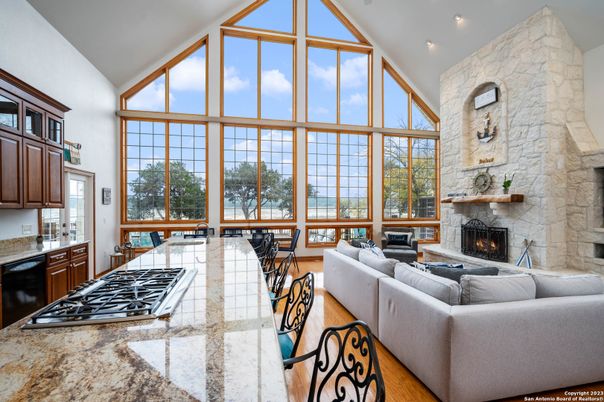 Dining room, Fireplace, Interior, Kitchen, Living room, Recessed Lighting, Stone Walls
