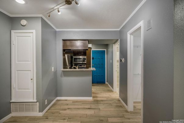 Interior, Recessed Lighting, Stainless Steel Appliances, Wood Texture Flooring