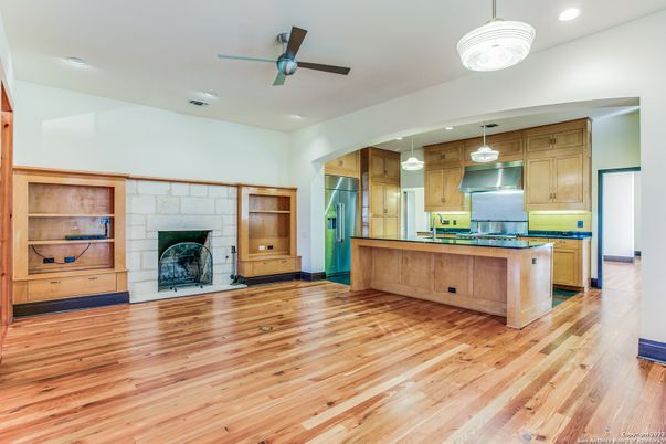 Fireplace, Interior, Kitchen, Pendant Lights, Recessed Lighting, Stone Walls, Wood Texture Flooring