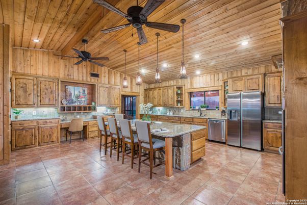 Dining room, Interior, Kitchen, Pendant Lights, Recessed Lighting, Stainless Steel Appliances, Wooden Ceilings, Wooden Walls