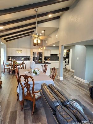 Dining room, Interior, Kitchen, Pendant Lights, Recessed Lighting, Stainless Steel Appliances, Wooden Beams, Wood Texture Flooring