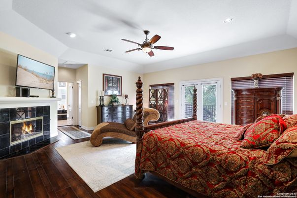Bedroom, Fireplace, Interior, Recessed Lighting, Wood Texture Flooring