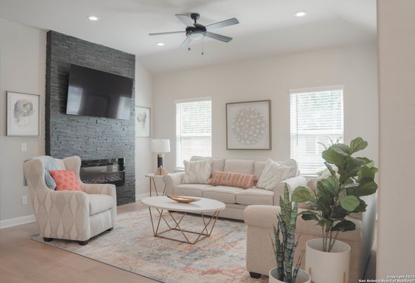 Fireplace, Interior, Living room, Recessed Lighting, Stone Walls, Wood Texture Flooring