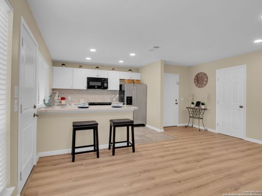 Interior, Kitchen, Recessed Lighting, Stainless Steel Appliances, Wood Texture Flooring