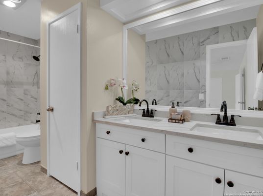 Bathroom, Dual Sink Vanities, Interior, Marble Walls, Recessed Lighting