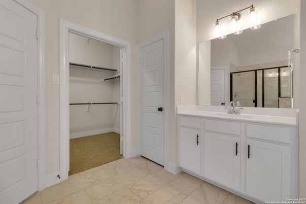 Bathroom, Dual Sink Vanities, Glass Shower, Interior, Marble, Walk-in Closets
