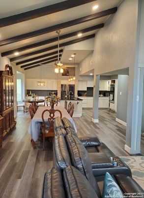 Dining room, Interior, Kitchen, Living room, Pendant Lights, Recessed Lighting, Stainless Steel Appliances, Wooden Beams, Wood Texture Flooring