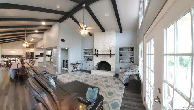 Dining room, Fireplace, Interior, Kitchen, Living room, Pendant Lights, Recessed Lighting, Stone Walls, Wooden Beams, Wood Texture Flooring