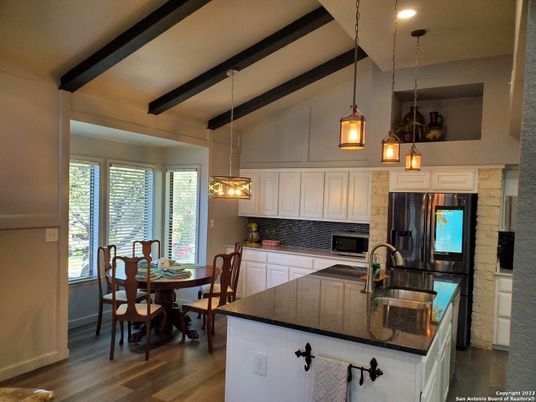 Dining room, Interior, Kitchen, Pendant Lights, Recessed Lighting, Stainless Steel Appliances, Wooden Beams, Wood Texture Flooring
