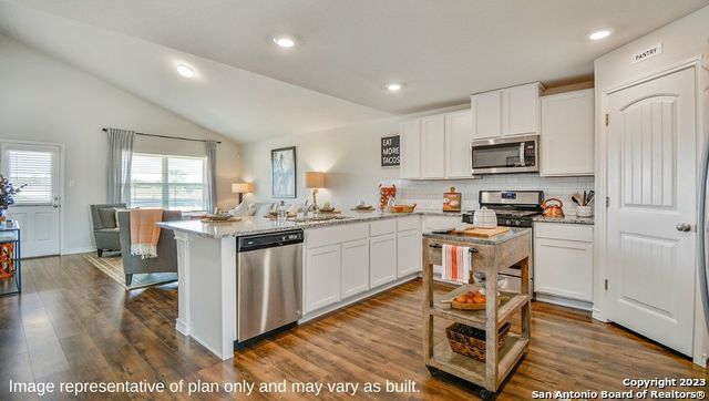 Dining room, Interior, Kitchen, Recessed Lighting, Stainless Steel Appliances, Wood Texture Flooring