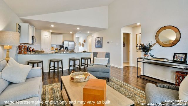 Dining room, Interior, Kitchen, Living room, Recessed Lighting, Stainless Steel Appliances, Wood Texture Flooring