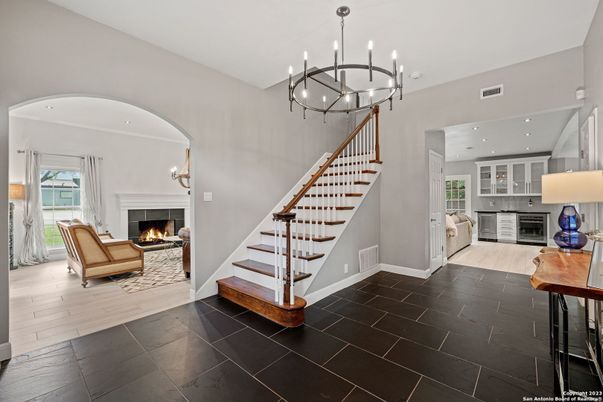 Chandelier, Fireplace, Interior, Kitchen, Pendant Lights, Recessed Lighting, Wood Texture Flooring