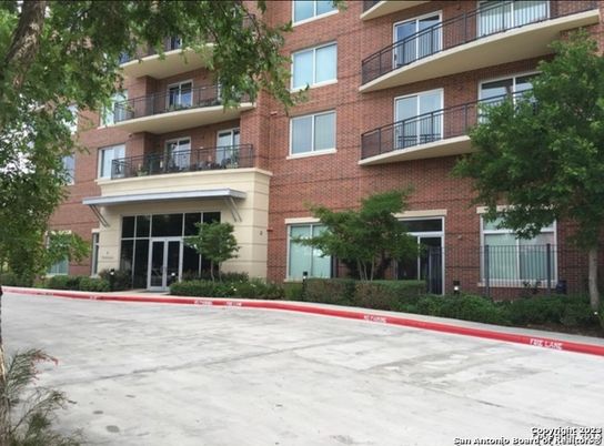Exterior, Facade, Brick Facade, Condo Building