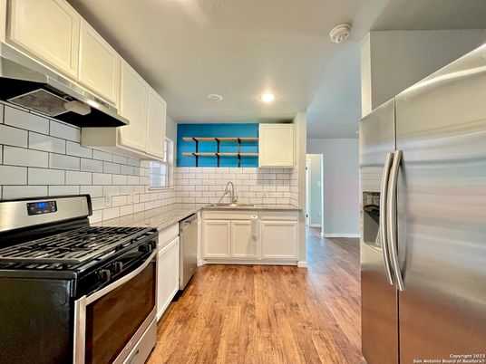 Interior, Kitchen, Recessed Lighting, Stainless Steel Appliances, Wood Texture Flooring