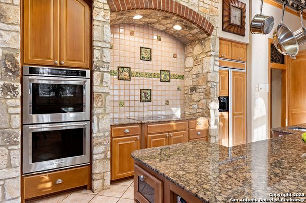 Interior, Kitchen, Recessed Lighting, Stainless Steel Appliances, Stone Walls