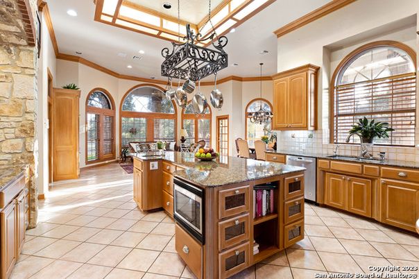 Dining room, Interior, Kitchen, Pendant Lights, Recessed Lighting, Stainless Steel Appliances, Stone Walls