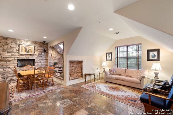 Dining room, Fireplace, Interior, Living room, Recessed Lighting, Stone Walls