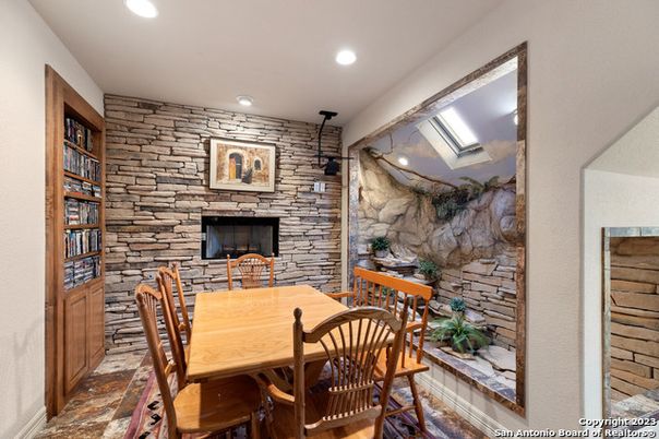 Dining room, Fireplace, Interior, Recessed Lighting, Stone Walls