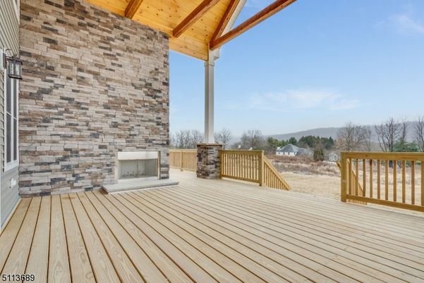 Exterior, Fireplace, Wood Texture Flooring