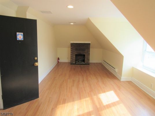 Empty room, Fireplace, Interior, Recessed Lighting, Wood Texture Flooring