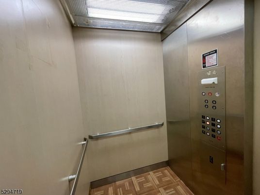 Elevator, Interior, Wood Texture Flooring
