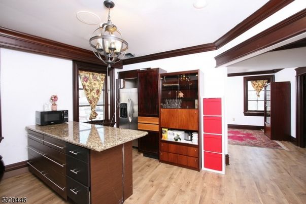 Chandelier, Interior, Kitchen, Pendant Lights, Recessed Lighting, Stainless Steel Appliances, Wood Texture Flooring