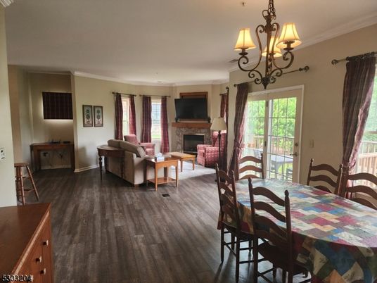 Chandelier, Dining room, Fireplace, Interior, Living room, Wood Texture Flooring