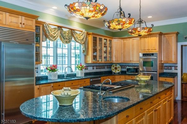 Chandelier, Interior, Kitchen, Pendant Lights, Recessed Lighting, Stainless Steel Appliances, Wood Texture Flooring