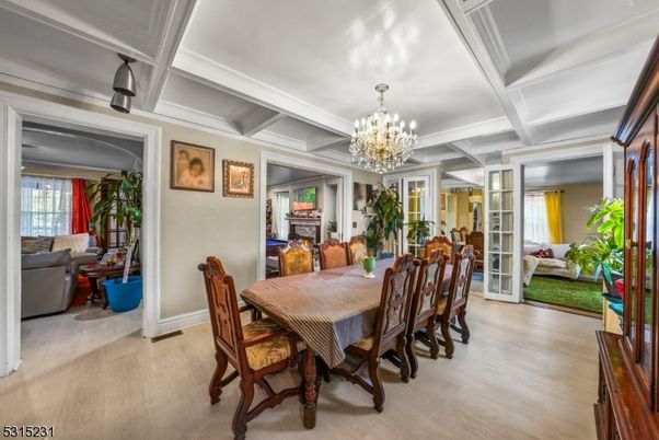 Chandelier, Dining room, Fireplace, Interior, Living room, Wood Texture Flooring